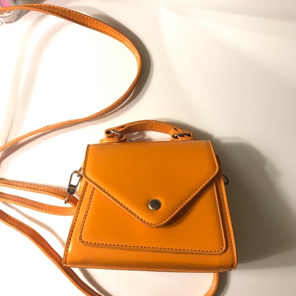 Urban Outfitters Handbags - Urban Outfitters Kendall mini Trapezoid Bag